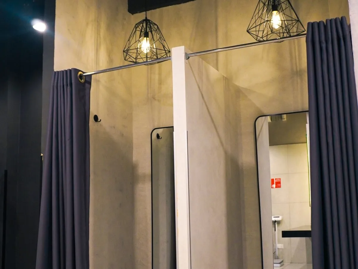 Changing cubicles, showers and a surau at Level Up Fitness Xpress Samarahan