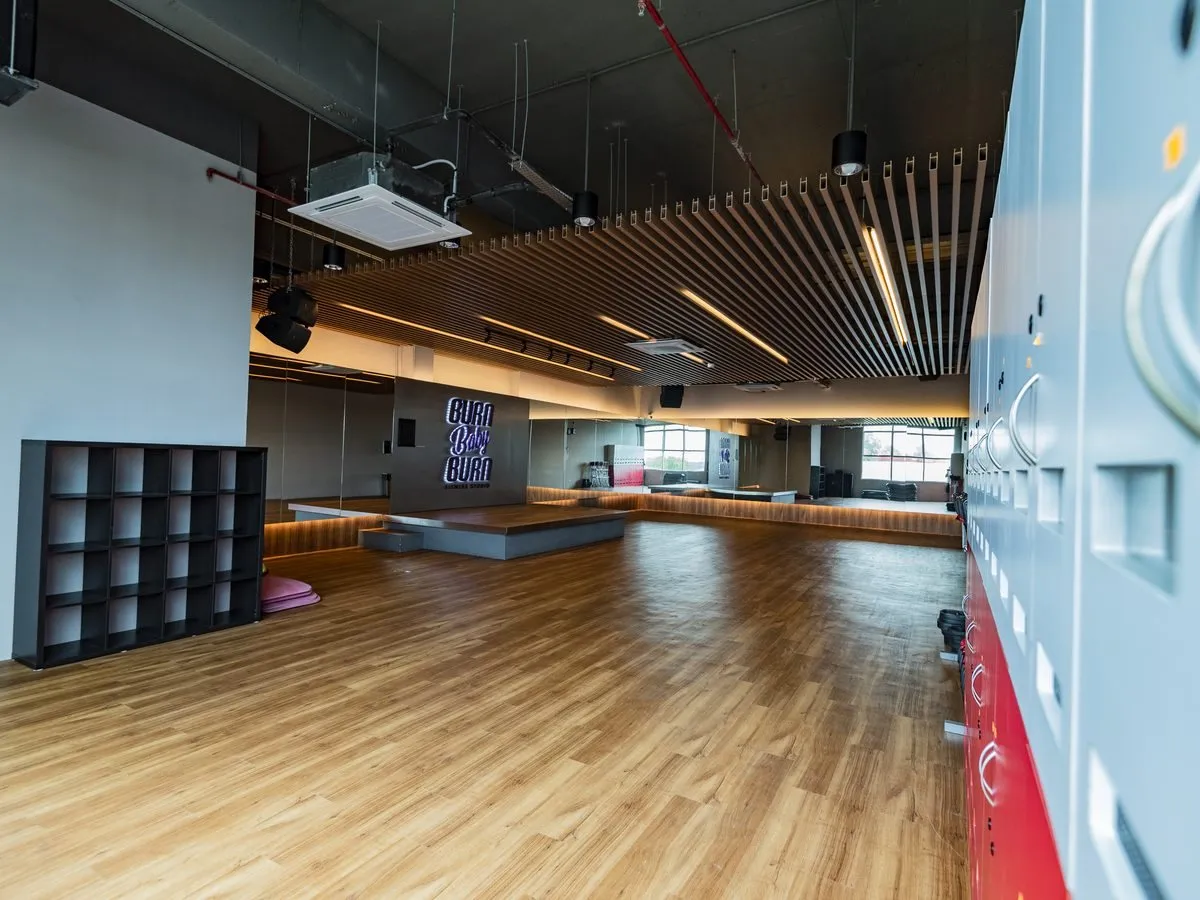 Wood-floored studio at Level Up Fitness Xpress SkyArena